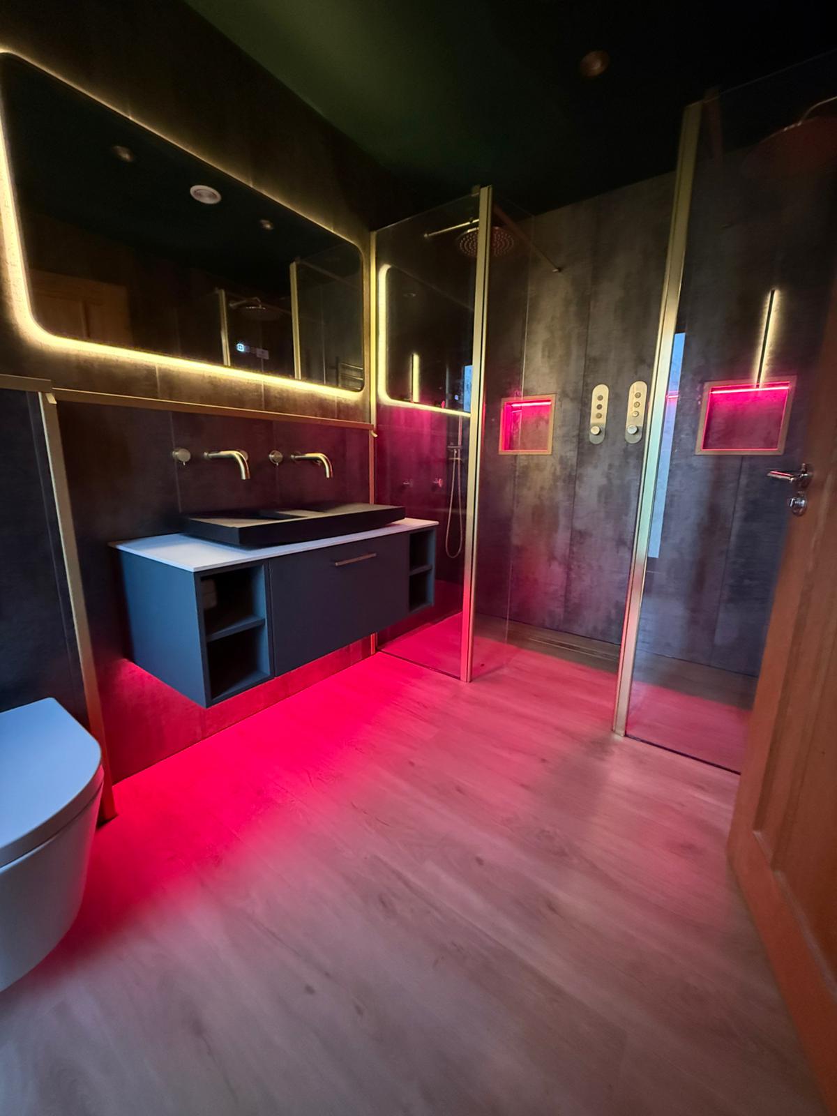 Wet room, tiled and lit